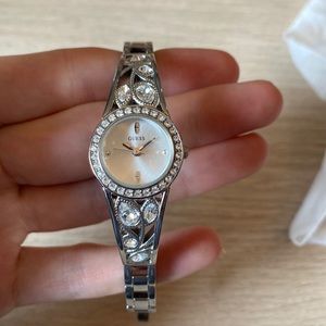 Dainty silver Guess watch